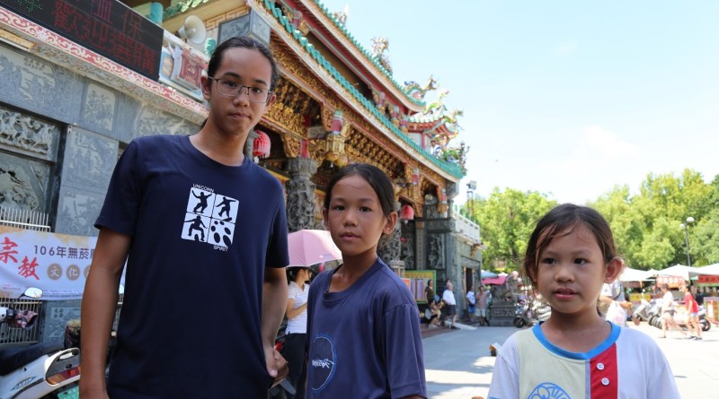 The Coolidge Brothers outside a temple in Tainan City, Taiwan